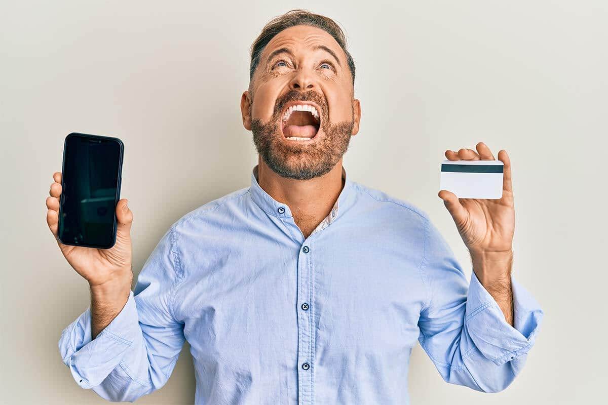 man upset about his credit cards